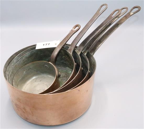 Set of 5 copper graduated saucepans